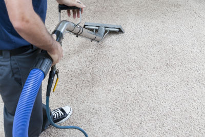A ProTech Carpet Care technician cleaning upholstery for yet another client in the Greensboro area.